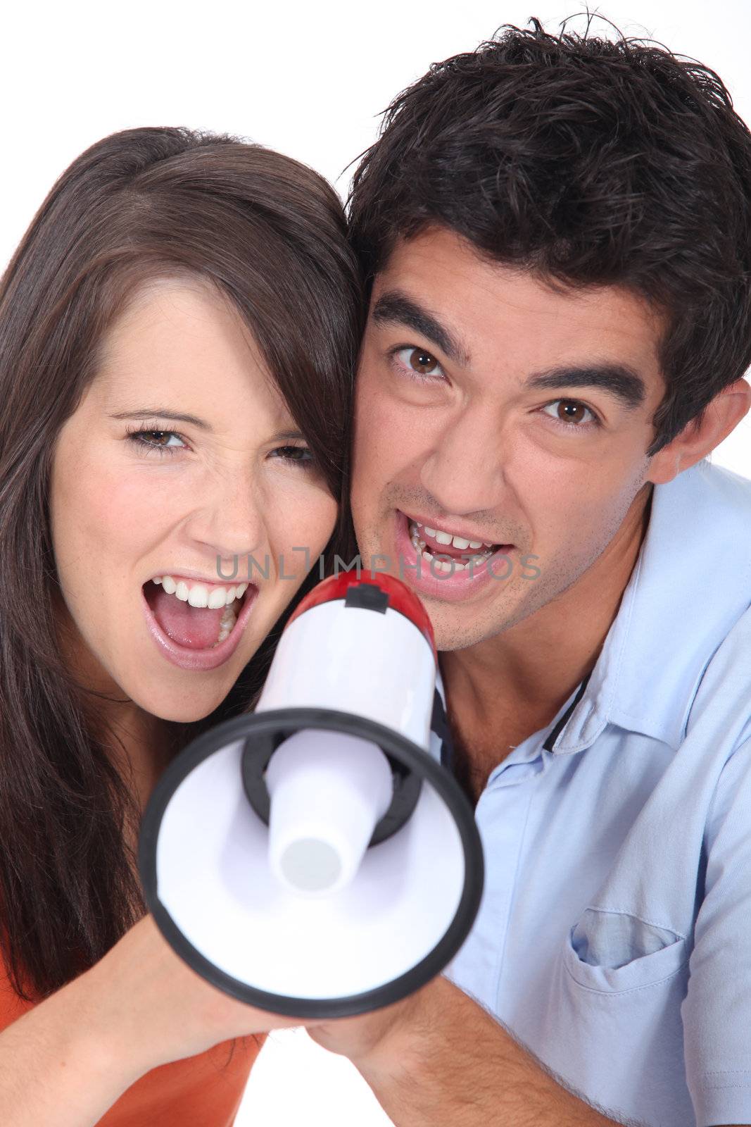 Couple with megaphone by phovoir