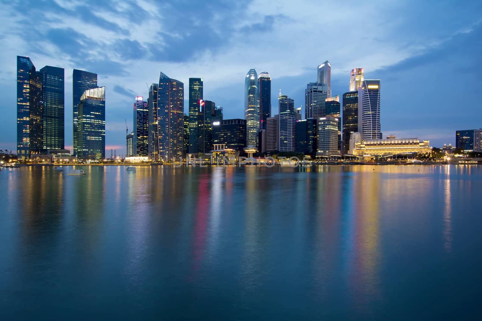 Singapore City Skyline along Waterfront Esplanade at Blue Hour