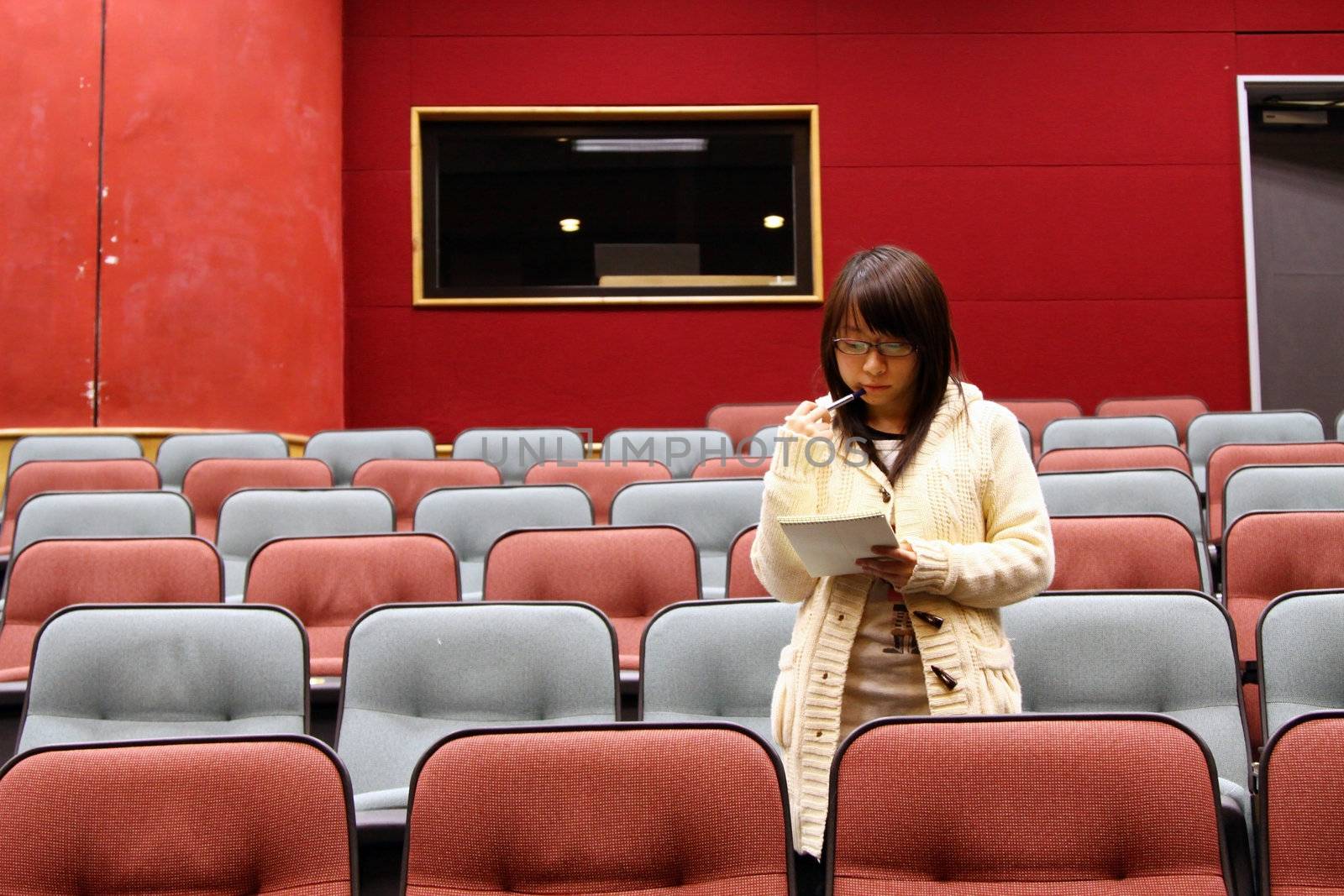 Asian student in lecture hall by kawing921