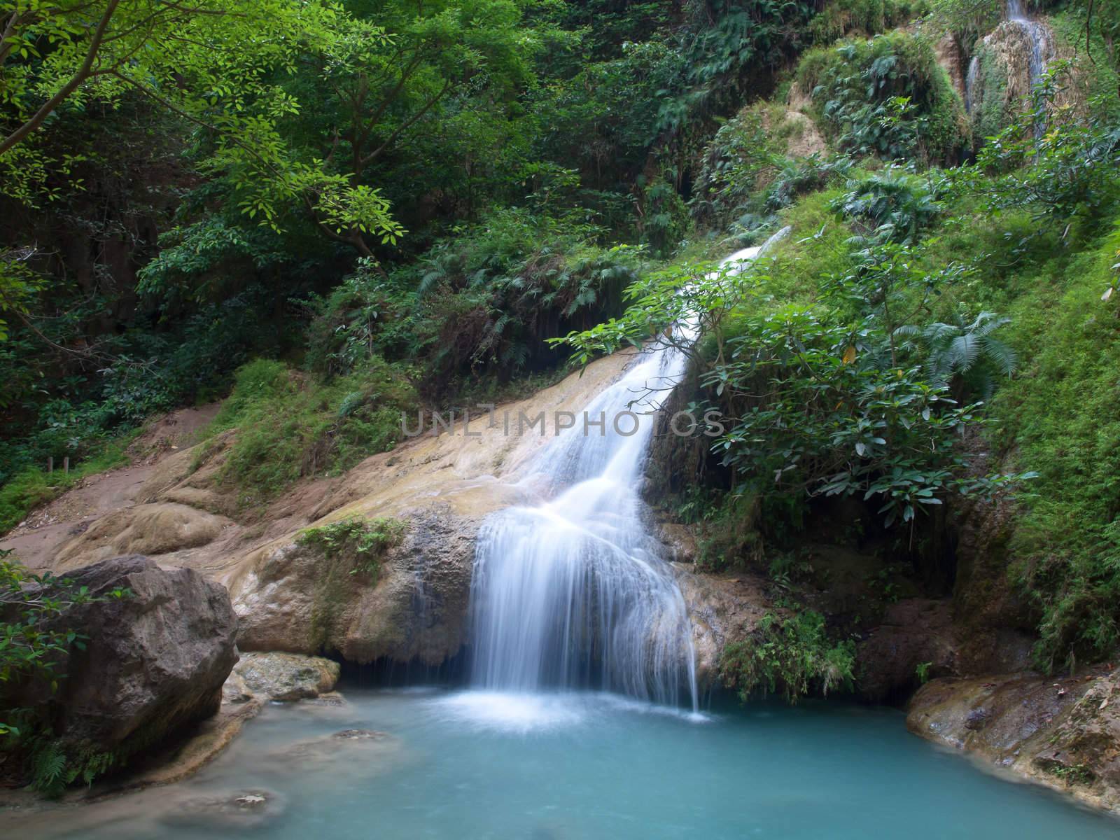 Emerald color water in tier seventh of Erawan waterfall, Erawan National Park, Kanchanaburi, Thailand