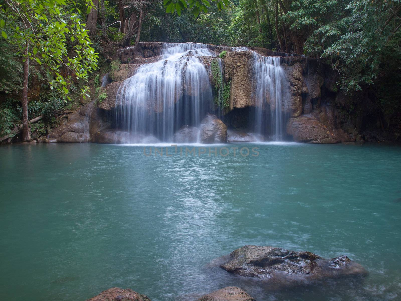 Emerald color water in tier second of Erawan waterfall, Erawan National Park, Kanchanaburi, Thailand