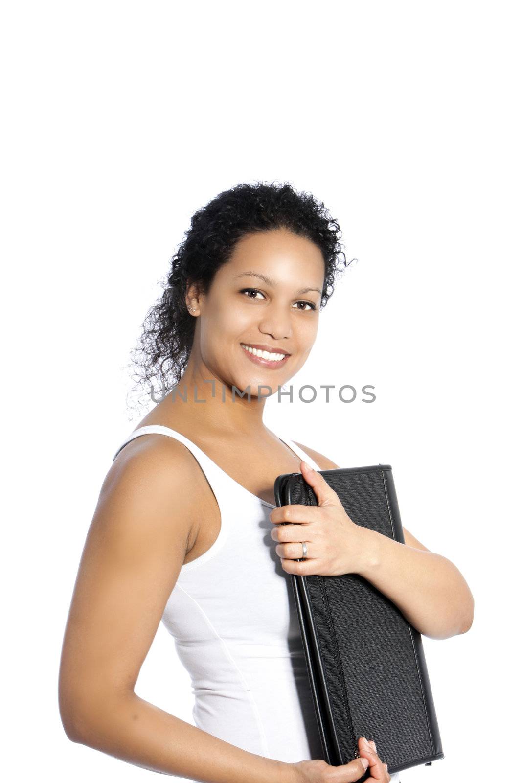 African American businesswoman or student holding a large black leather folder to her chest while smiling at the camera isolated on white