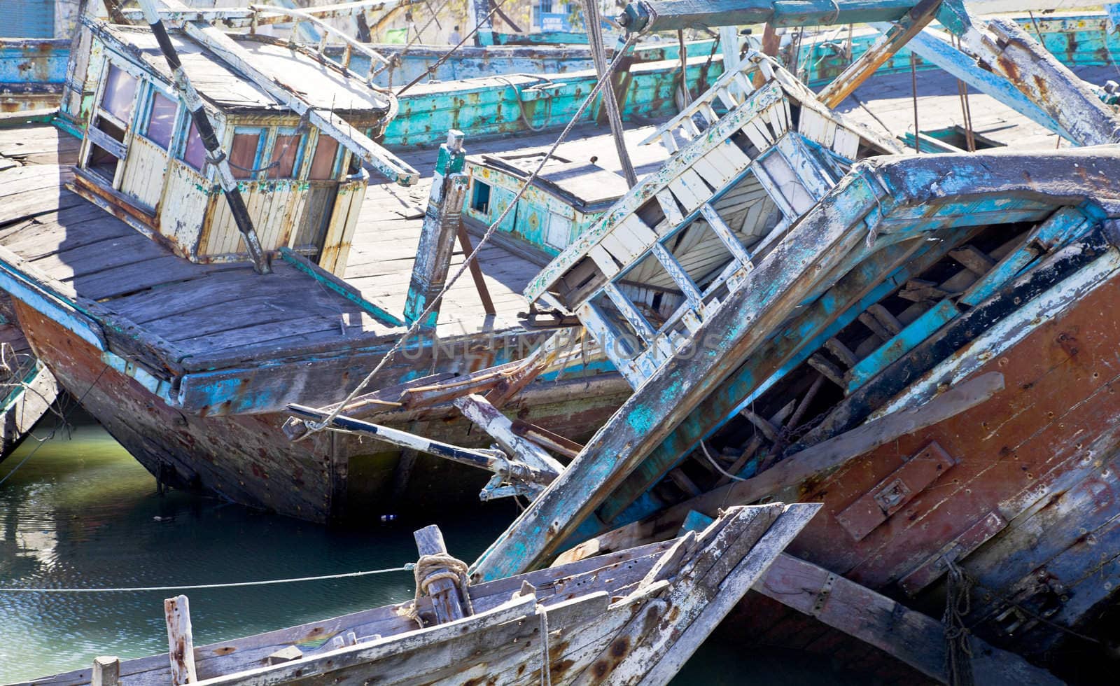 Dwarka Roadtrip. Boat graveyard in Gujarat India of wooden shipping that has been shipwrecked or taken out of service