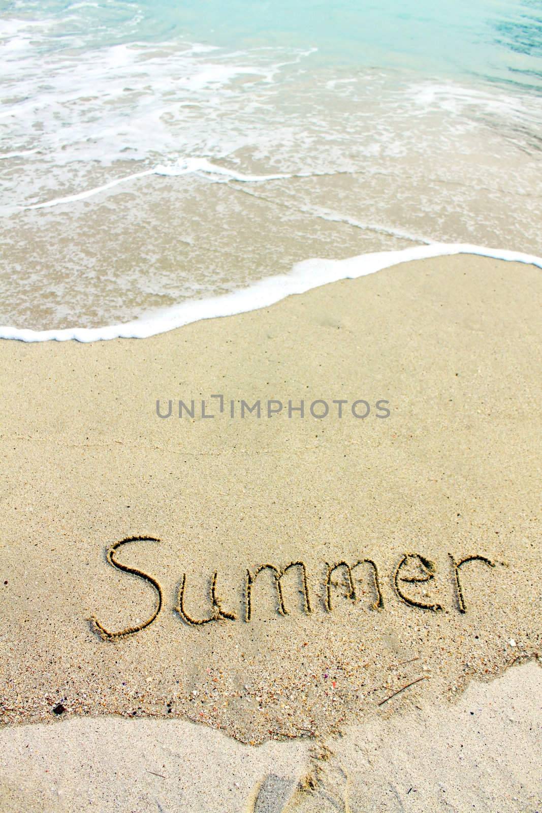 Summer words on sand