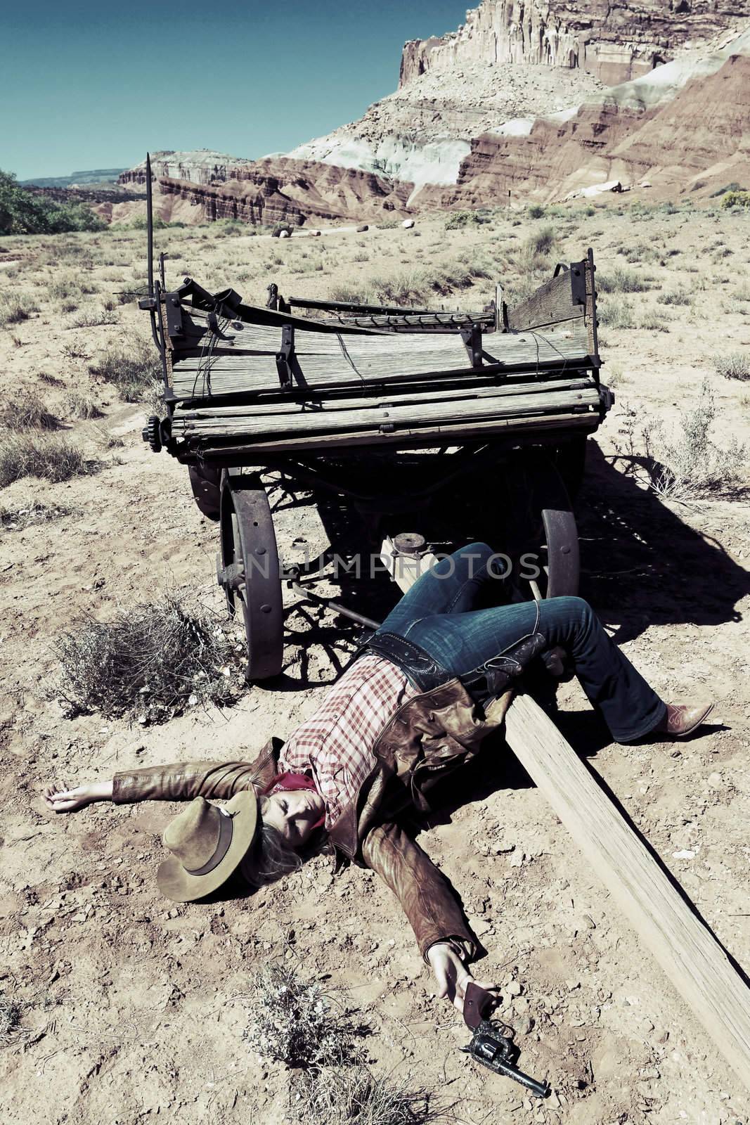 dead cowgirl lying on the floor, western style