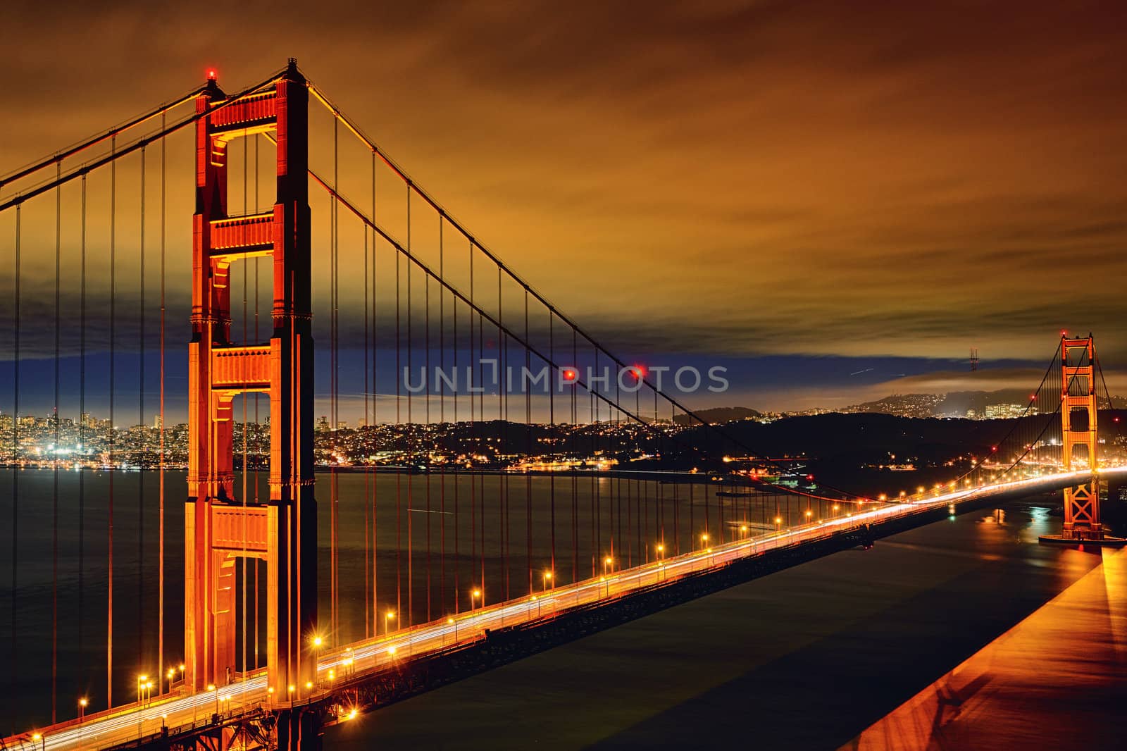 Night scene of Golden Gate Bridge and San Francisco lights