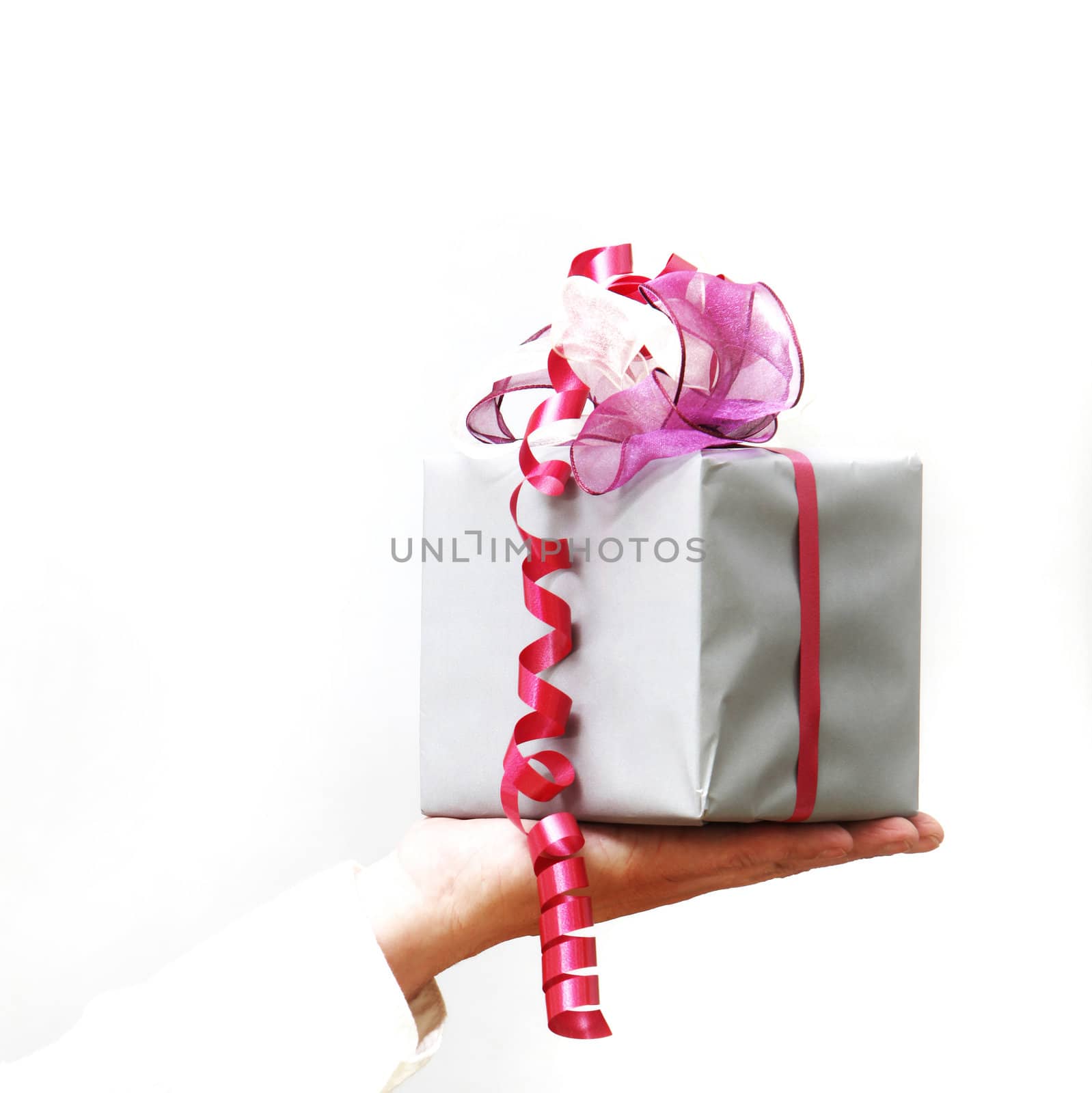 Woman presented gifts to the hand - a white background - square