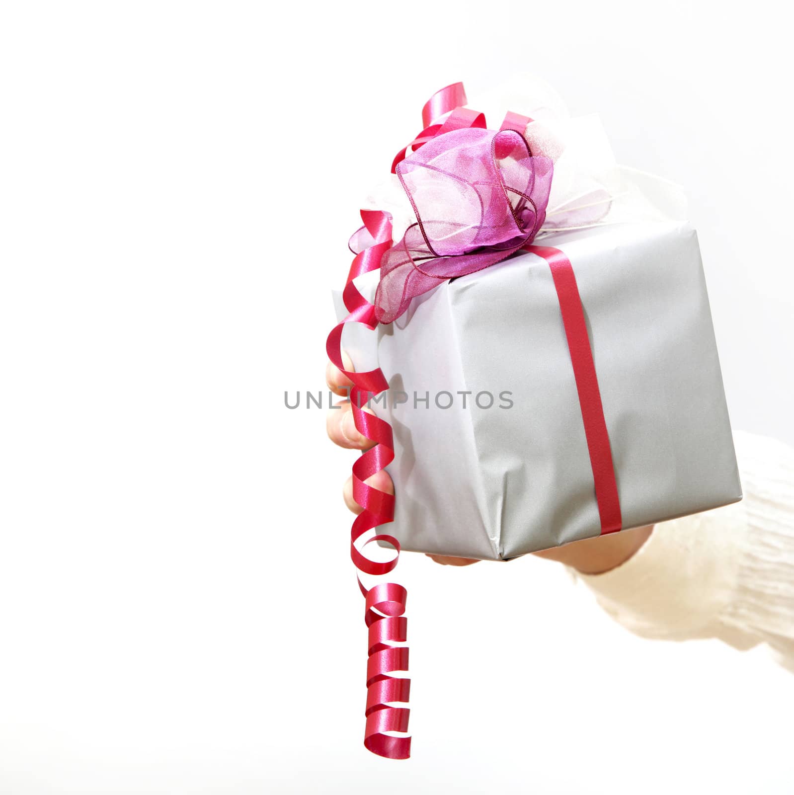 Woman presented gift against white background, square