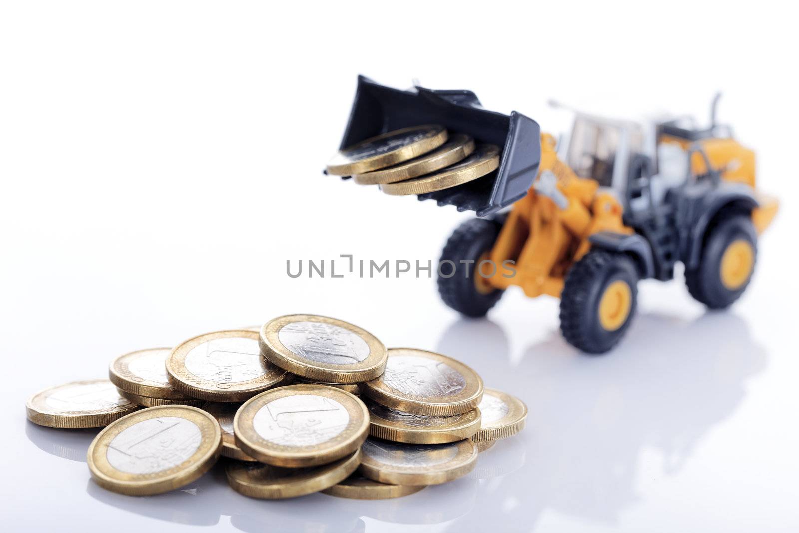 euro money coins and loader isolated on white background 