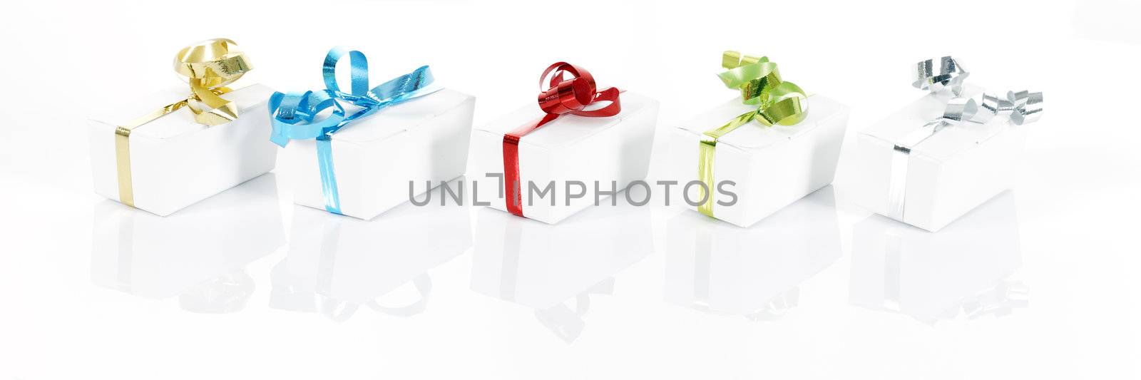 Set of colorful gift boxes with bows and ribbons. 