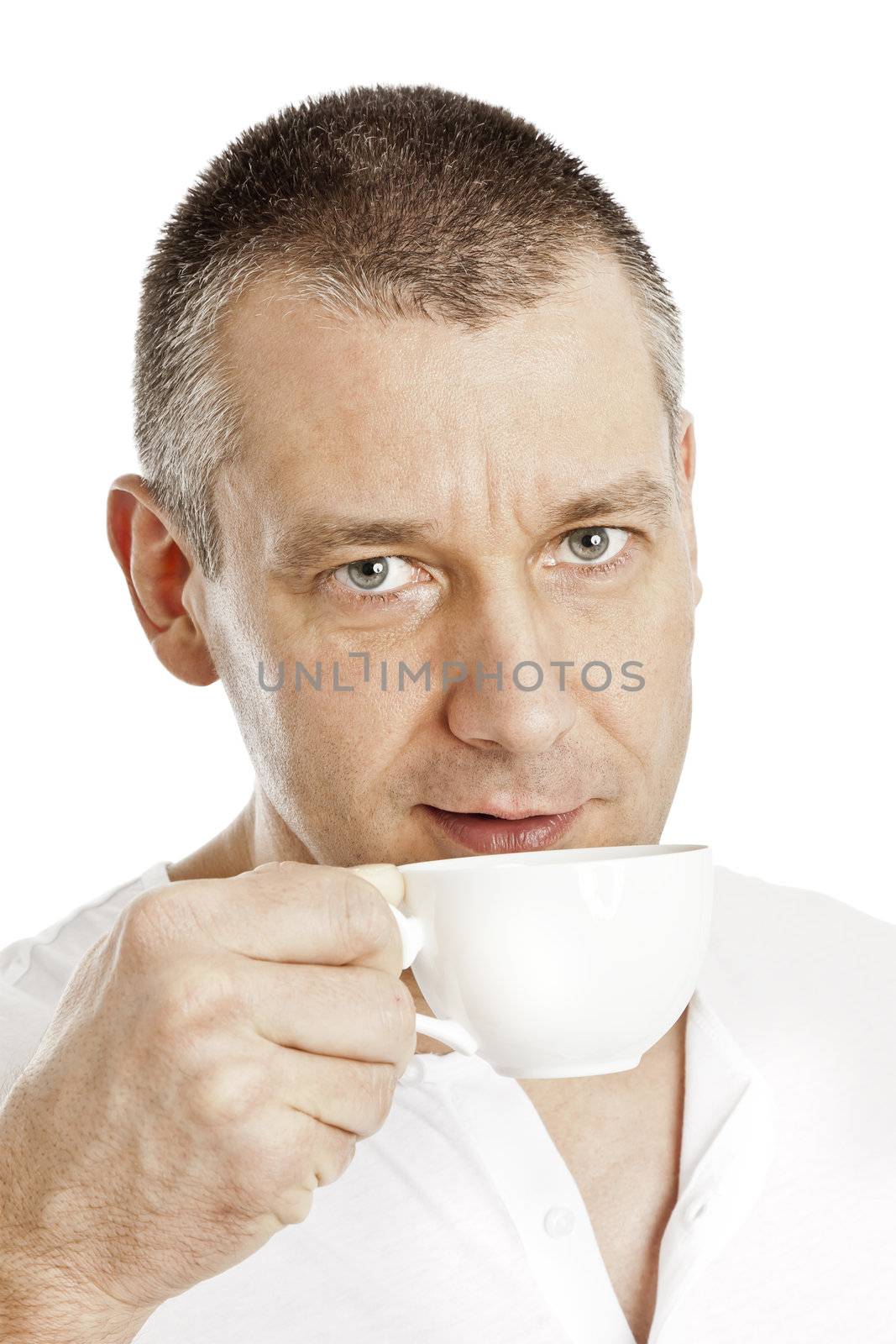 An image of a handsome middle age man with a coffee