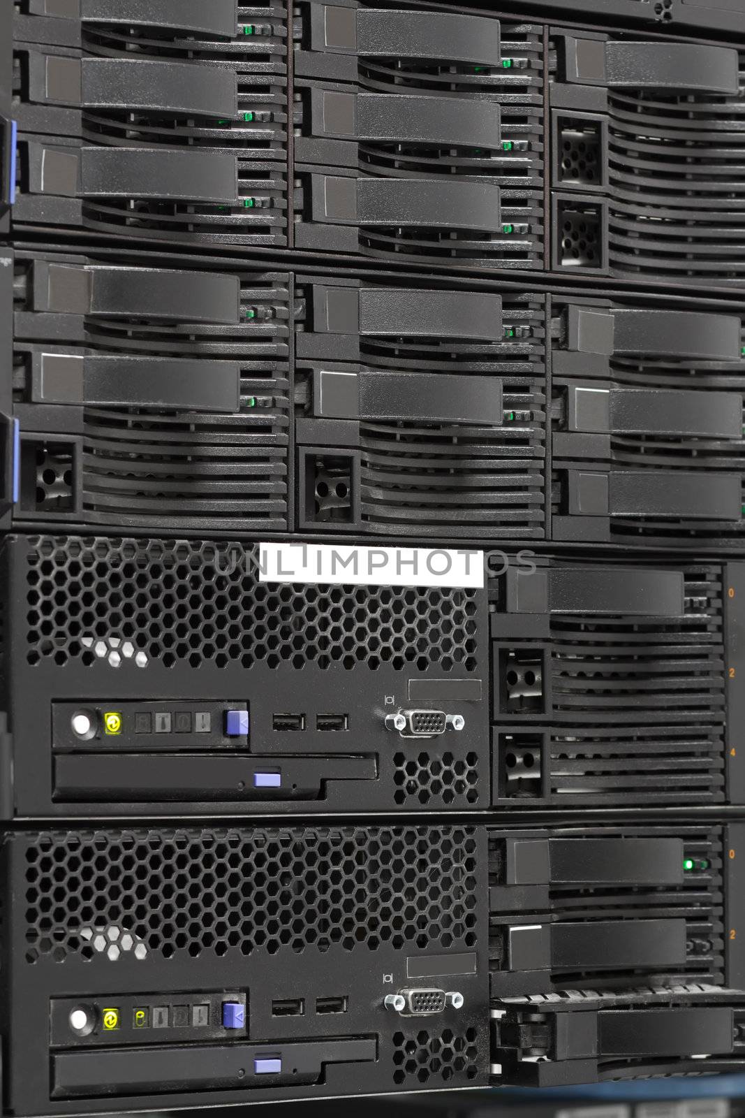 servers stack with hard drives in a datacenter for backup and data storage