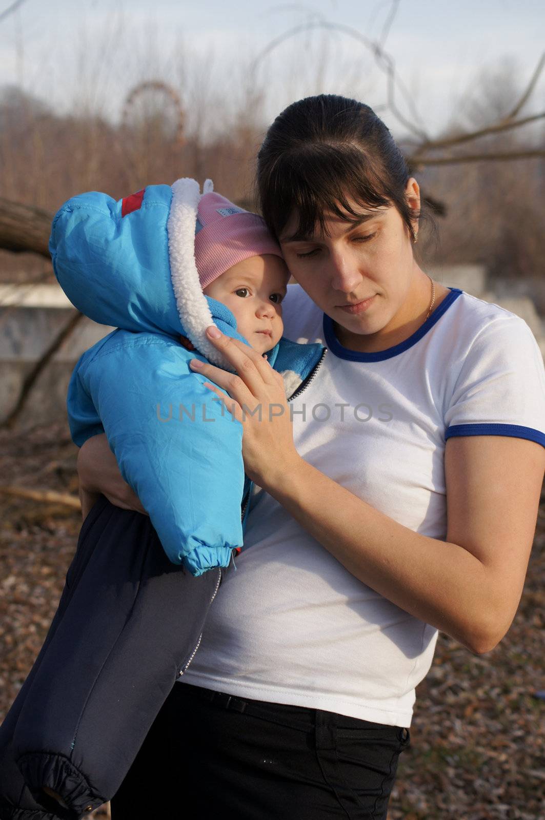 Young mother walks in the park with your child by Viktoha