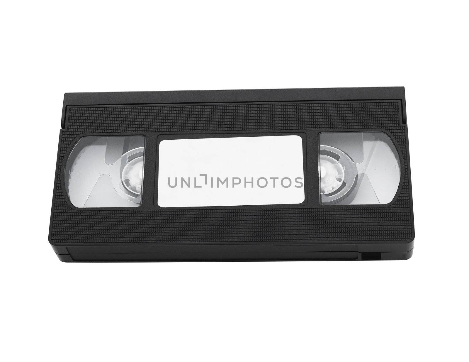 Old VHS video cassette tape with blank label for copyspace