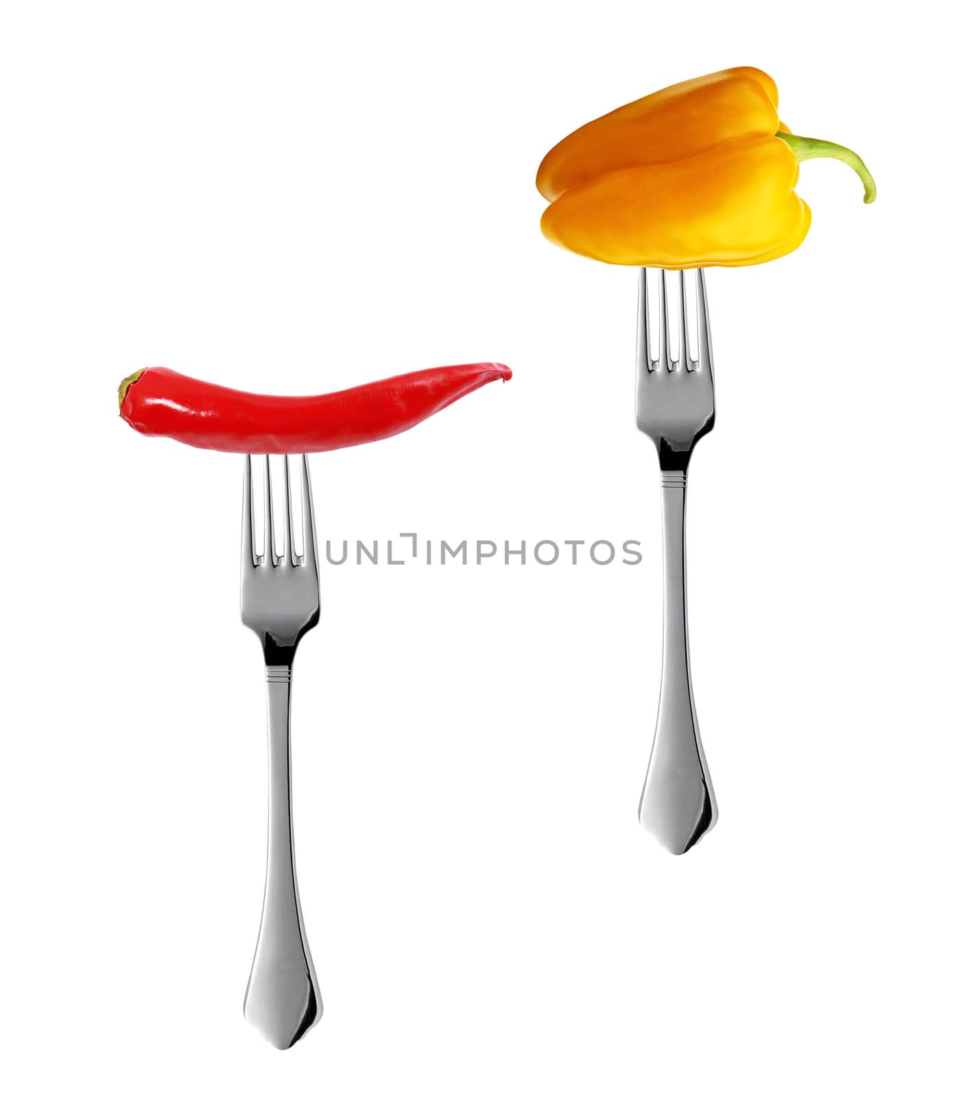 Red hot chili pepper with yellow pepper pricked on the steel fork
