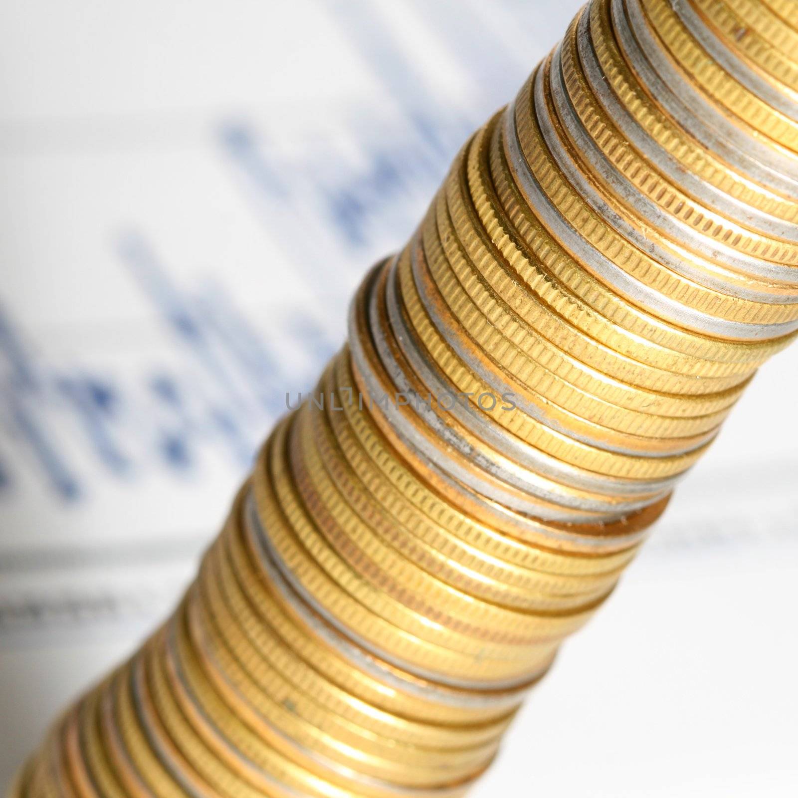 coins and financial graph on background