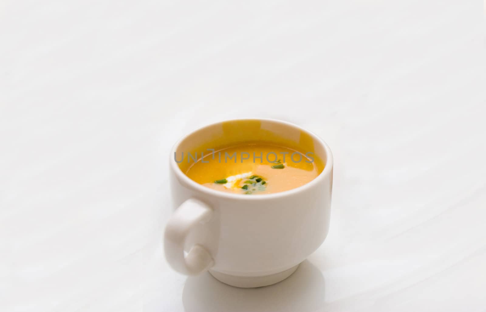 Carrot soup with sour cream