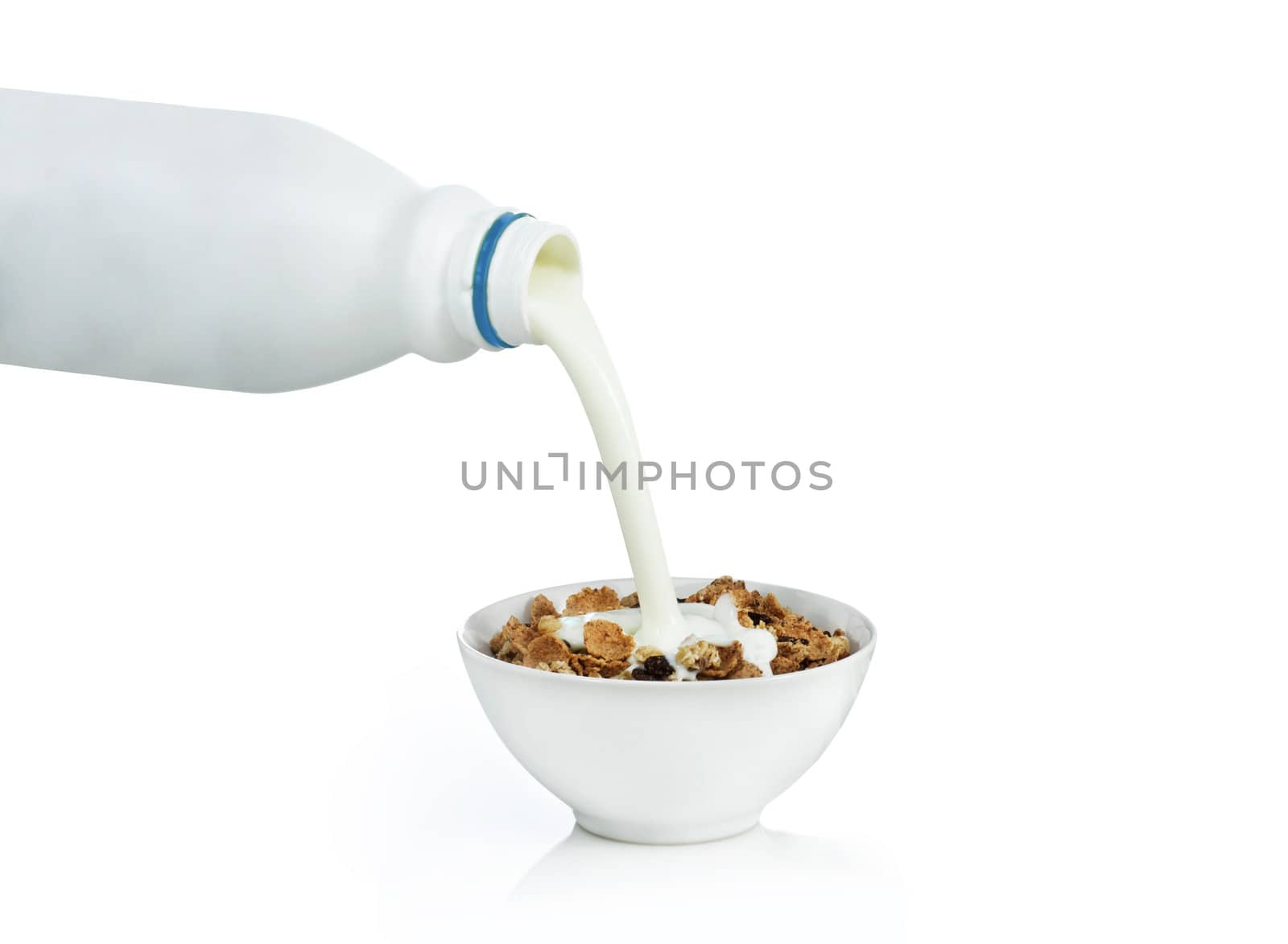 Healthy Breakfast-Cornflakes and Milk Splash.Isolated on white