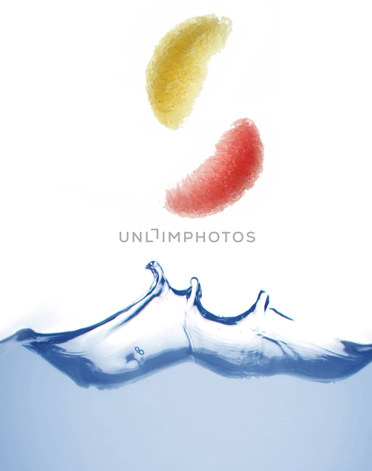 Orange in a water on a white background