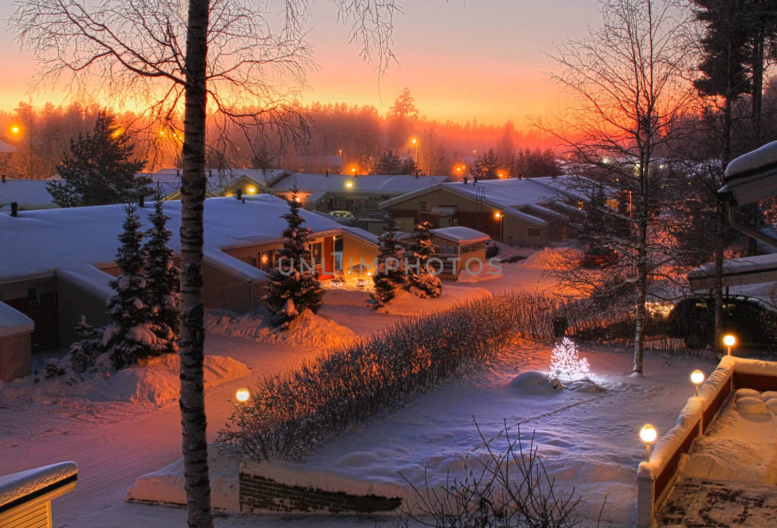 Snowy Christmas street evening view by anterovium