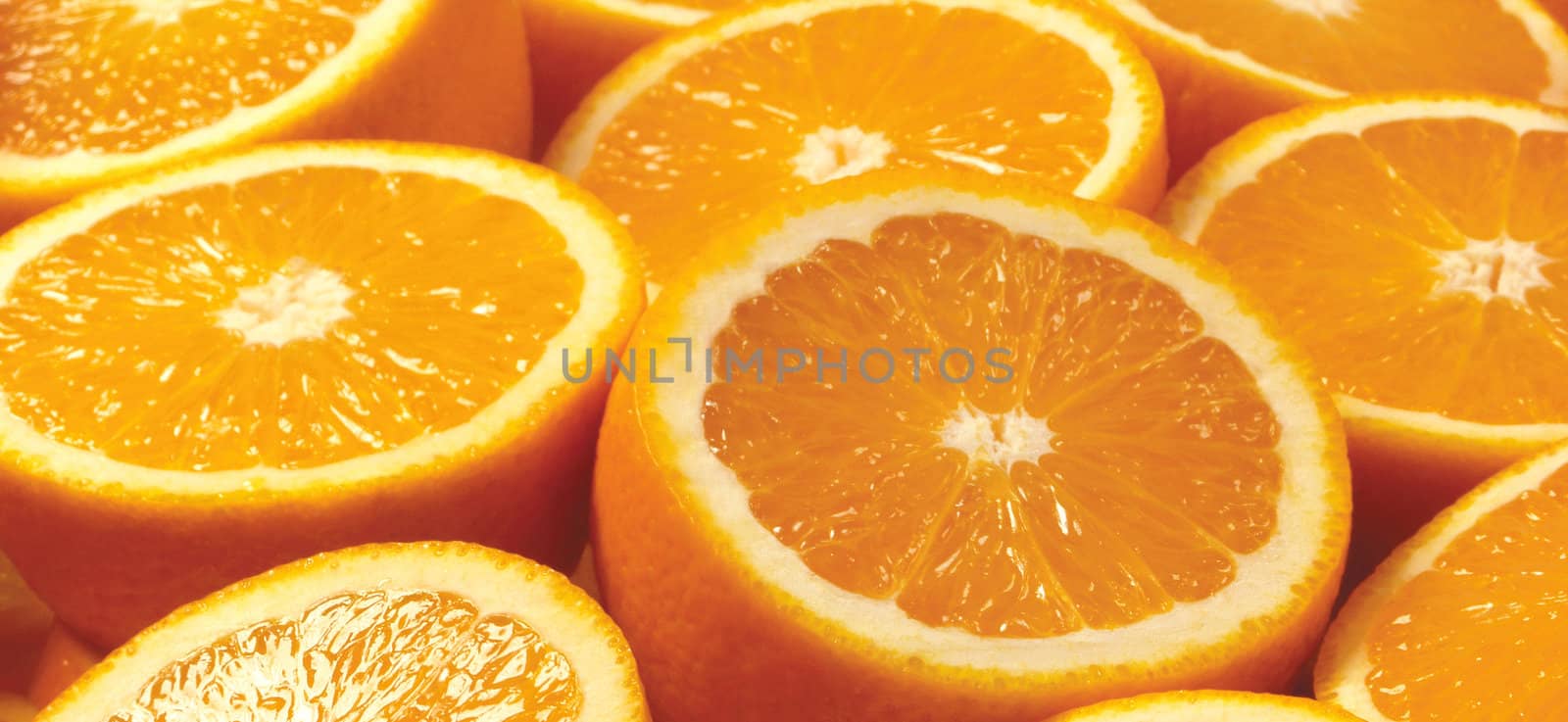 Abstract background with citrus-fruit of orange slices by ozaiachin