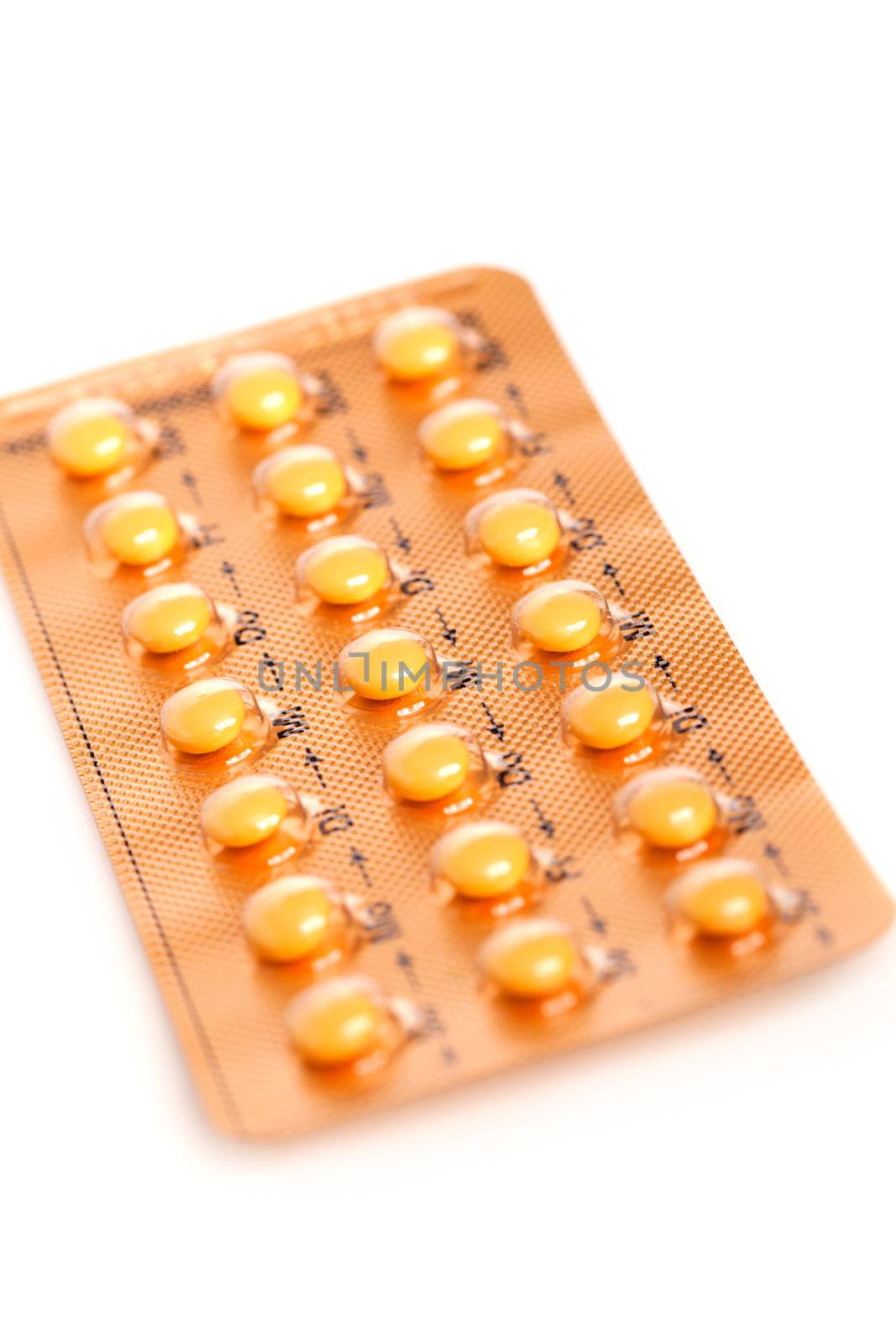 tablets (Birth Control Pills) on a white background