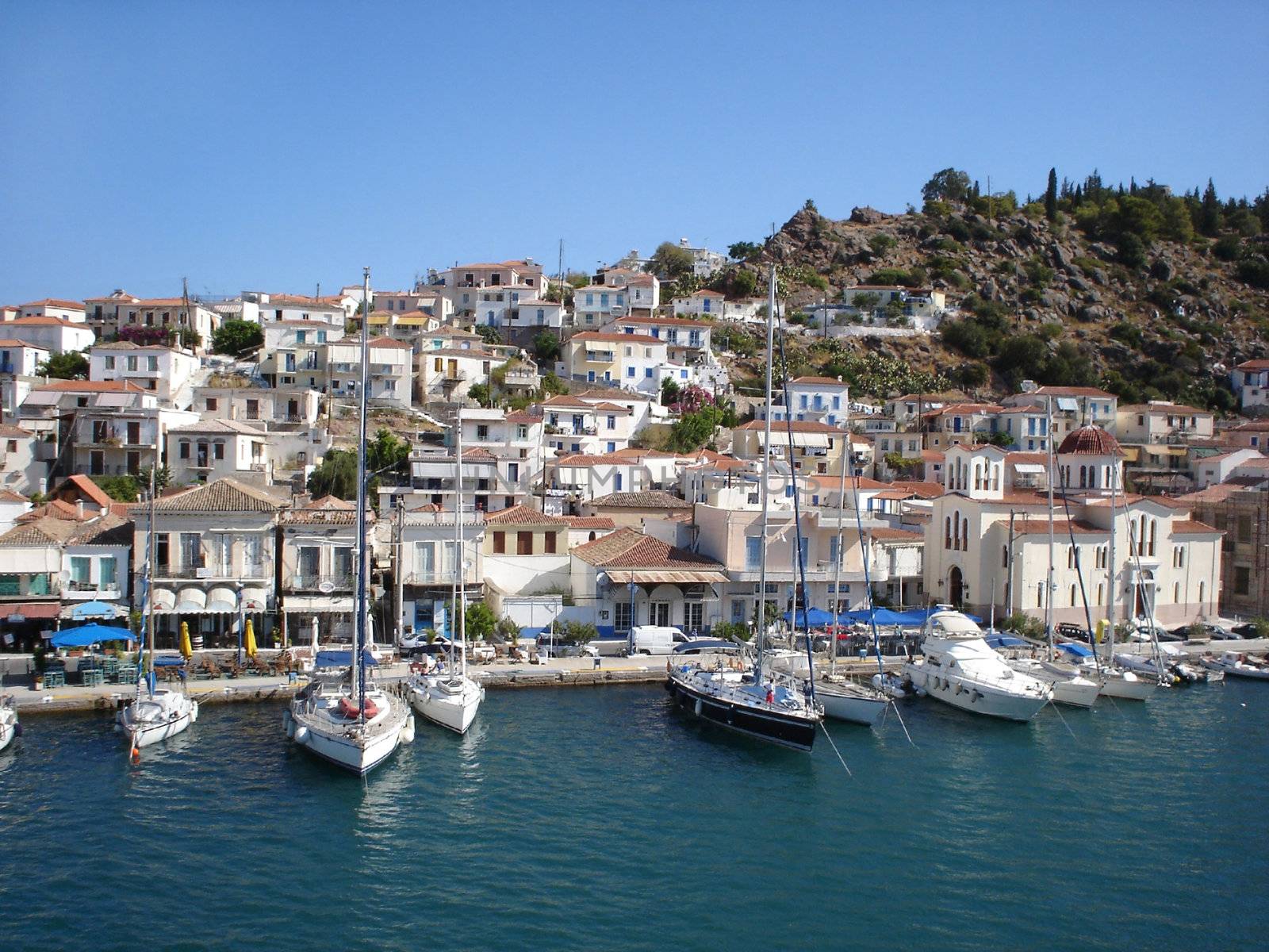 Poros port and a quay with yachts                               