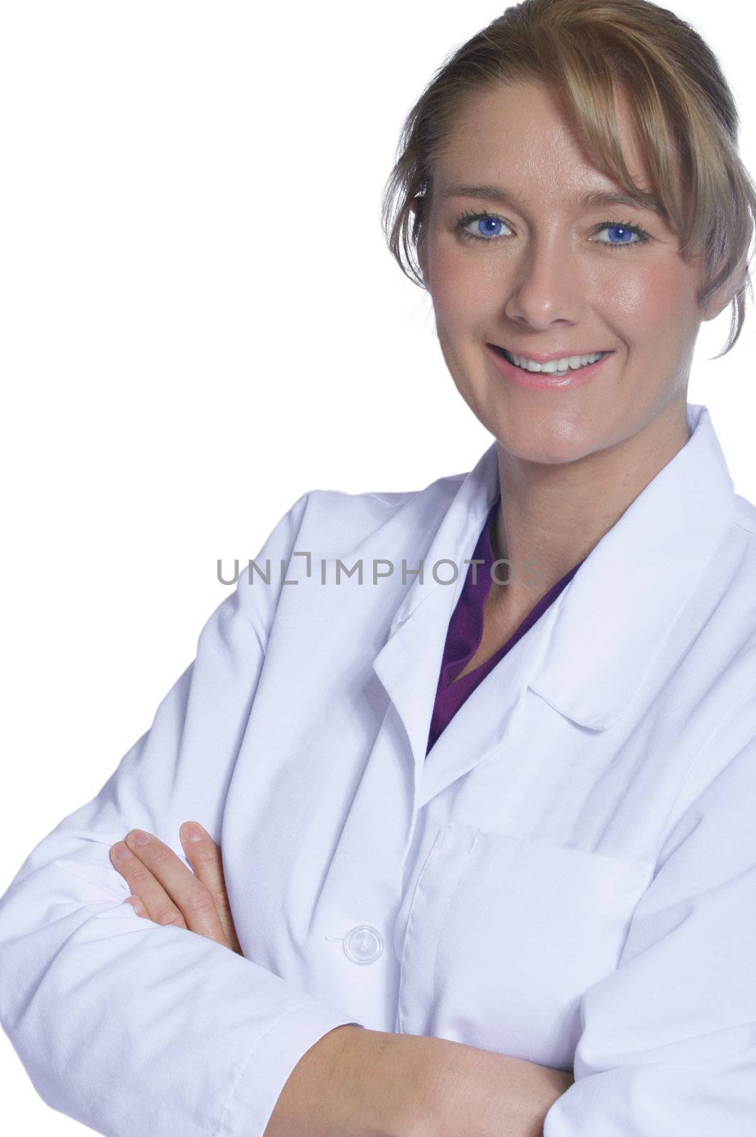 Beautiful female doctor in white doctor's coat, standing arms crossed