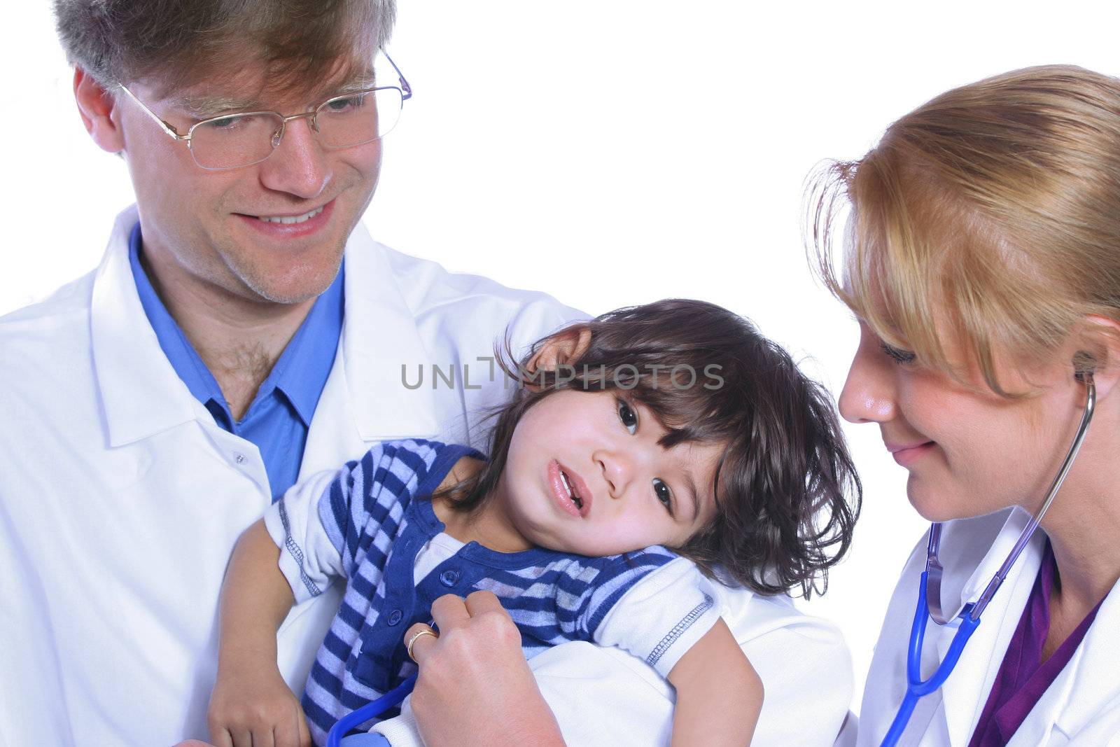 Doctors taking care of toddler