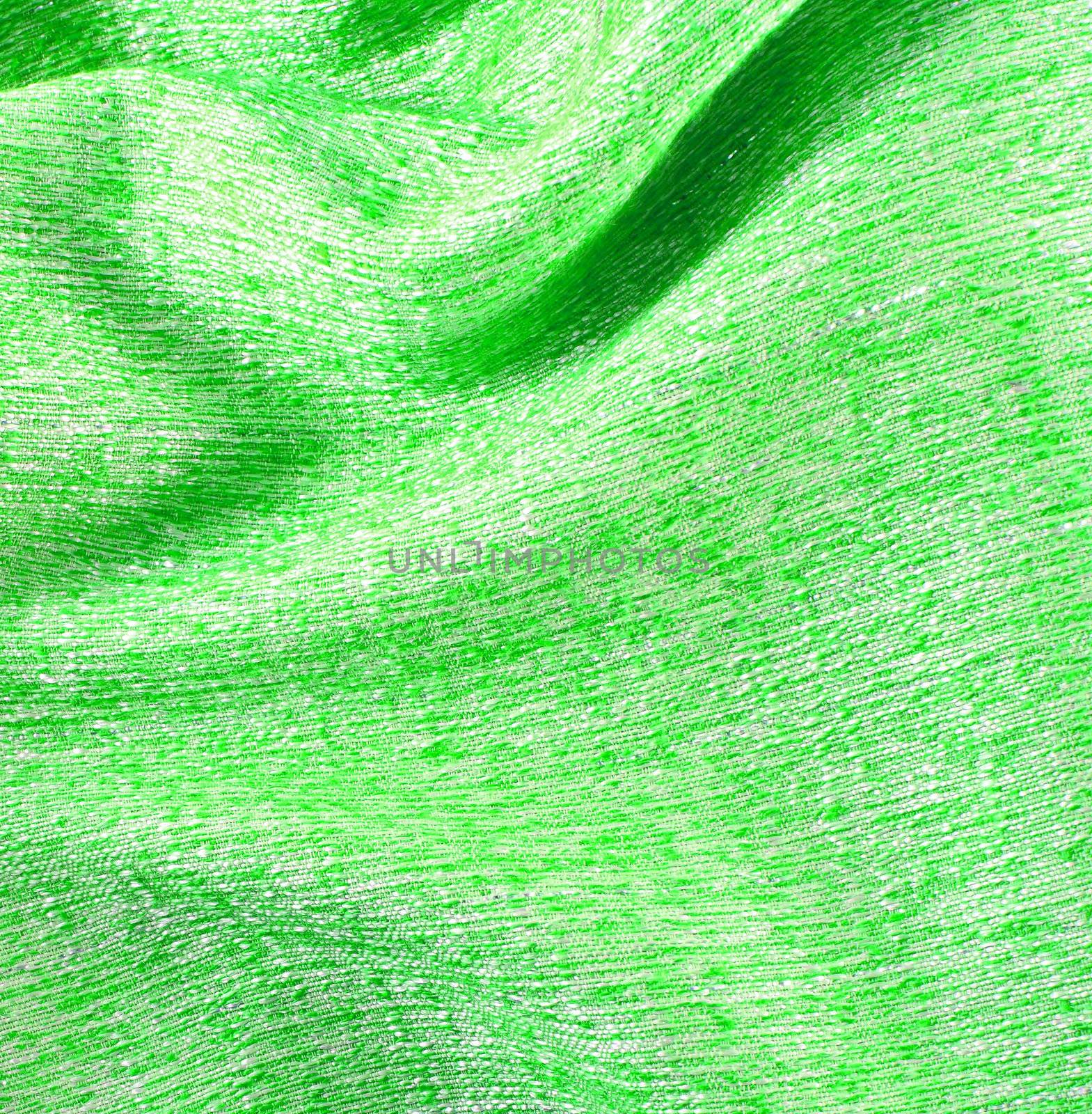 Green crumpled silk fabric textured background  by nuchylee