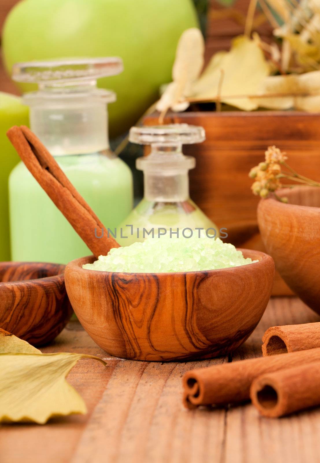 green herbal salt in the wooden bowl.