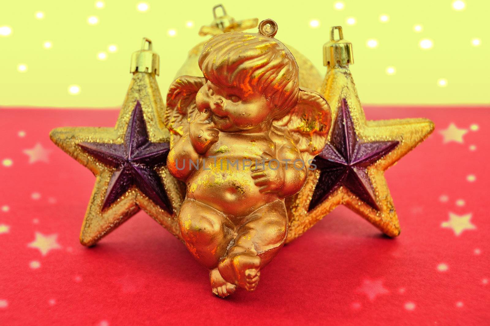 Cupid and golden stars baubles. Christmas decoration.
