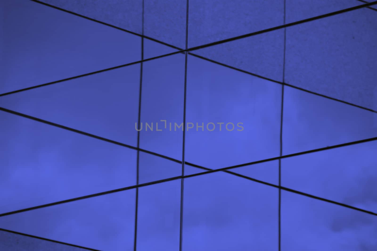 Glass building abstract exterior. Modern architecture facade blue lines background.