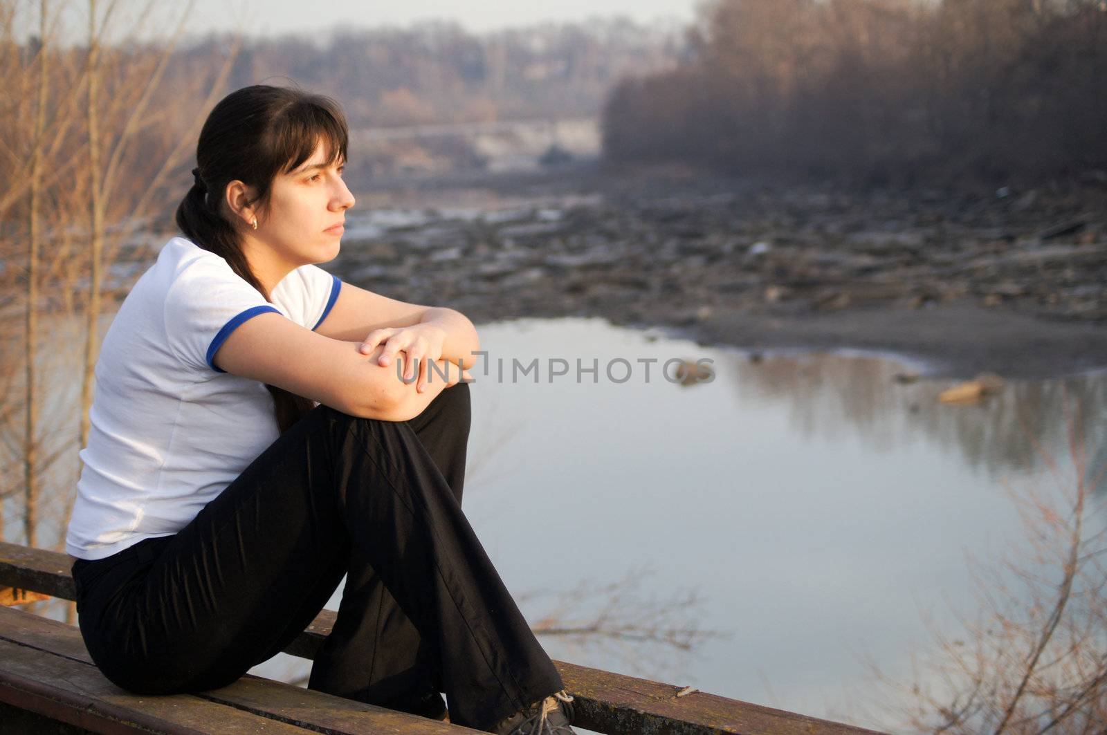 Young brunette girl walks in the park by Viktoha