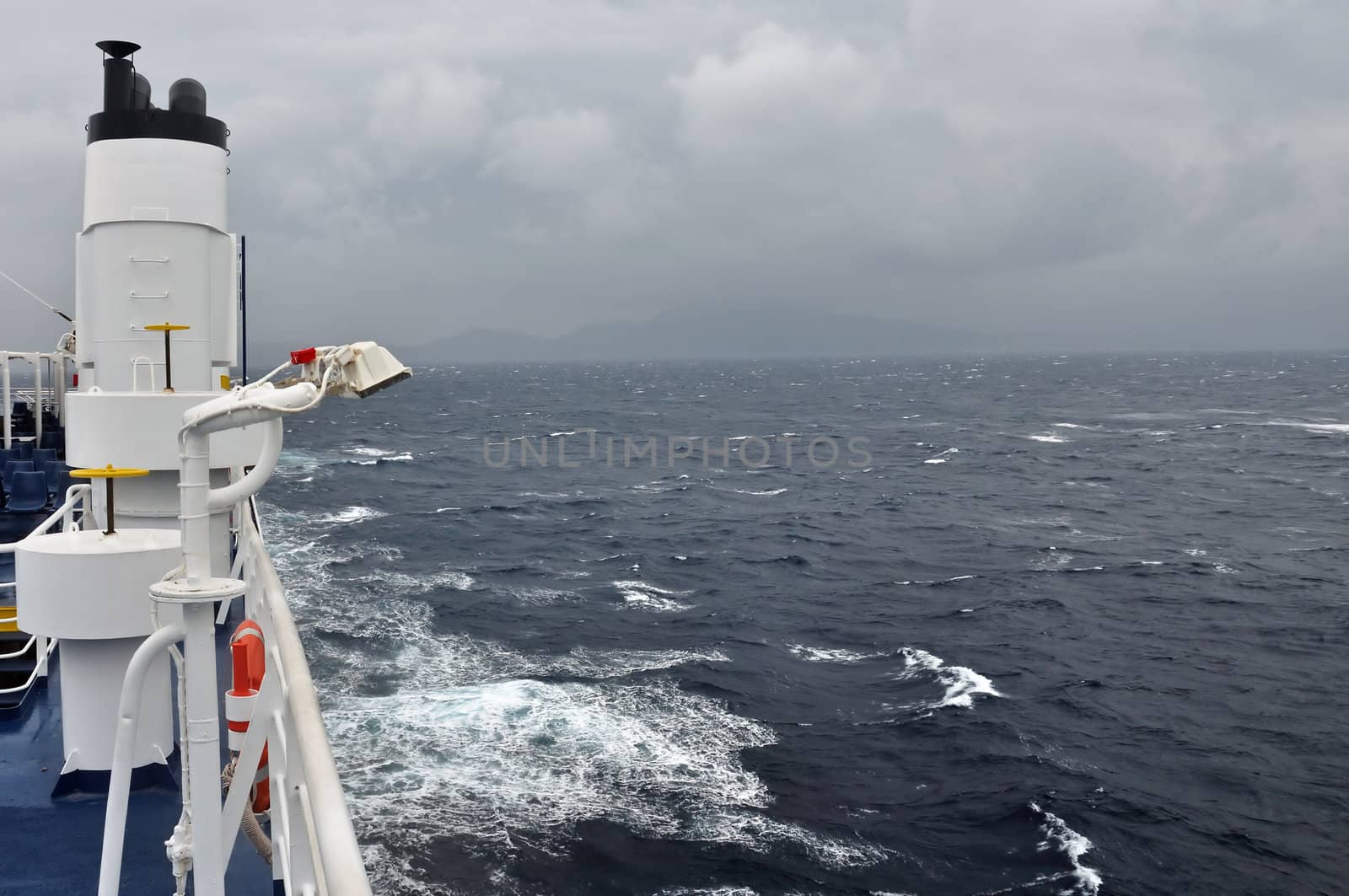 Sea and cloudy sky horizon from ferry boat deck. Arrival on the island of Zakynthos.