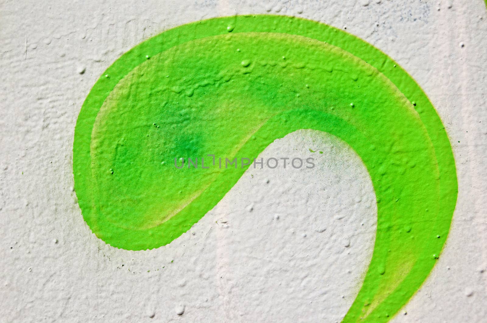 Wall with green paint curve shape. Abstract texture.