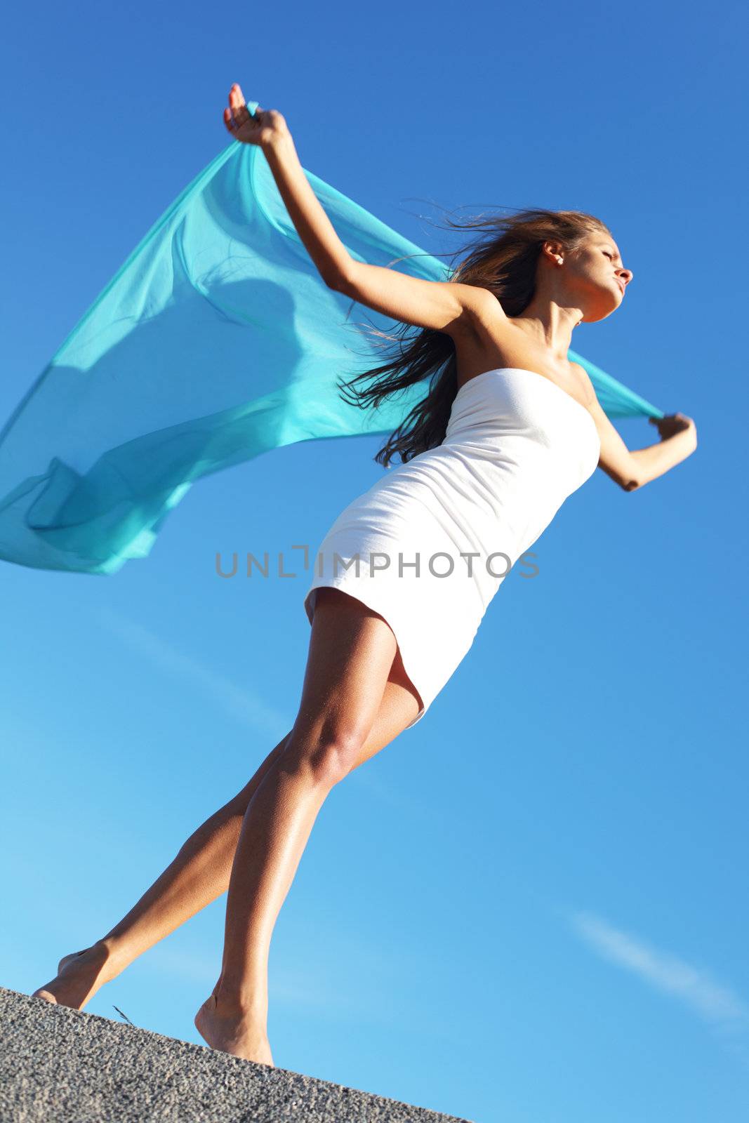 woman fly in the blue sky by fabric