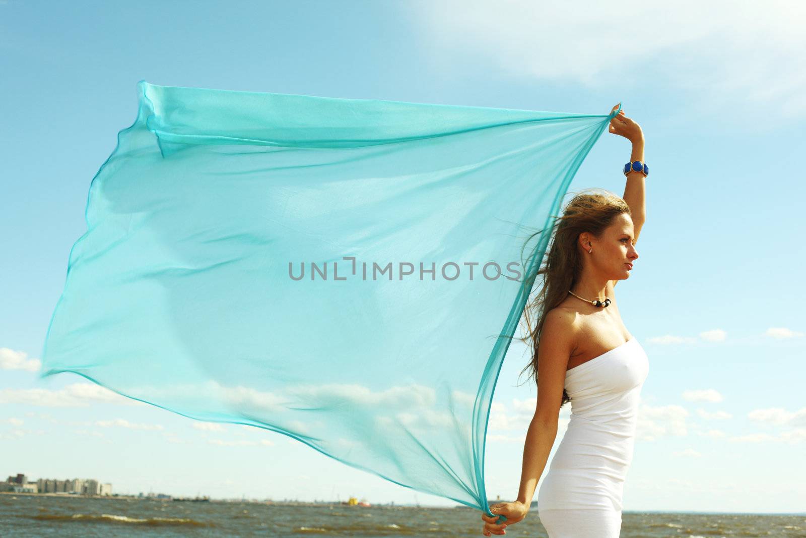 woman fly in the blue sky by fabric