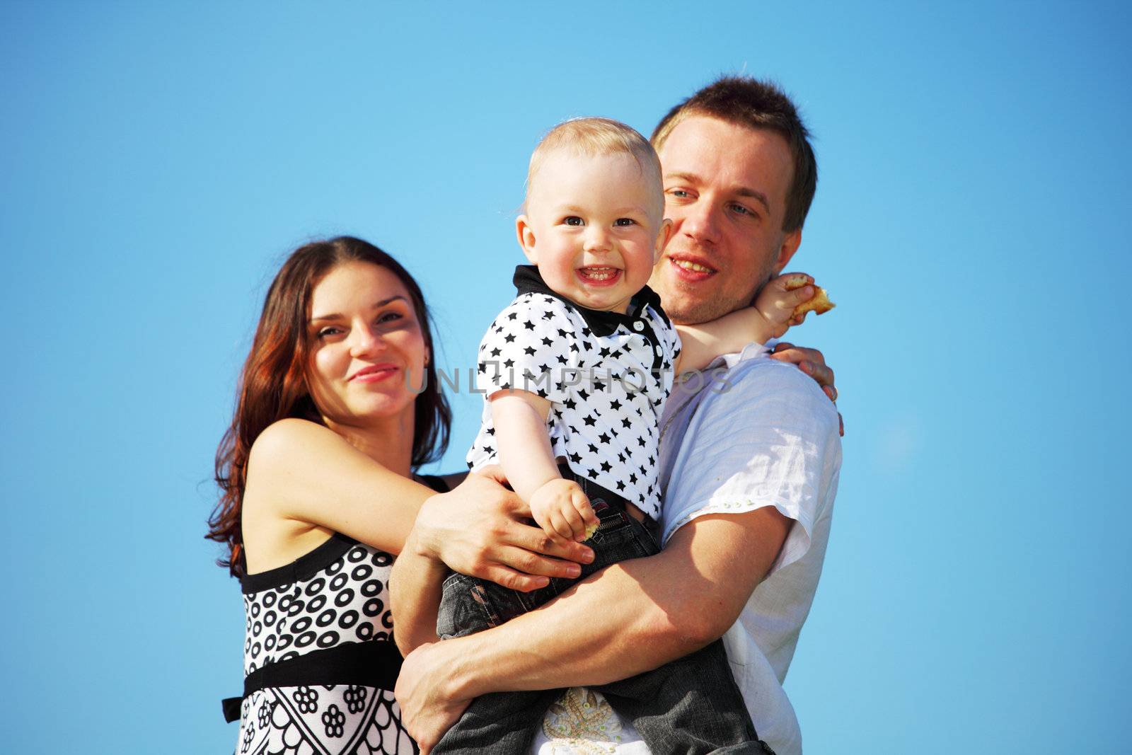 happy family blue sky on background