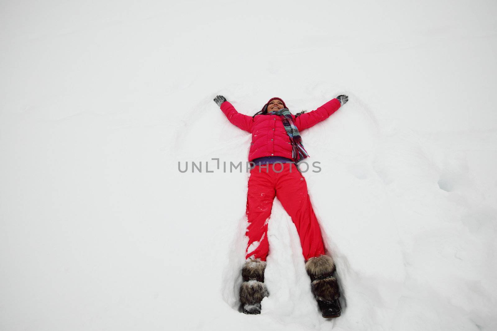 winter woman lay on snow