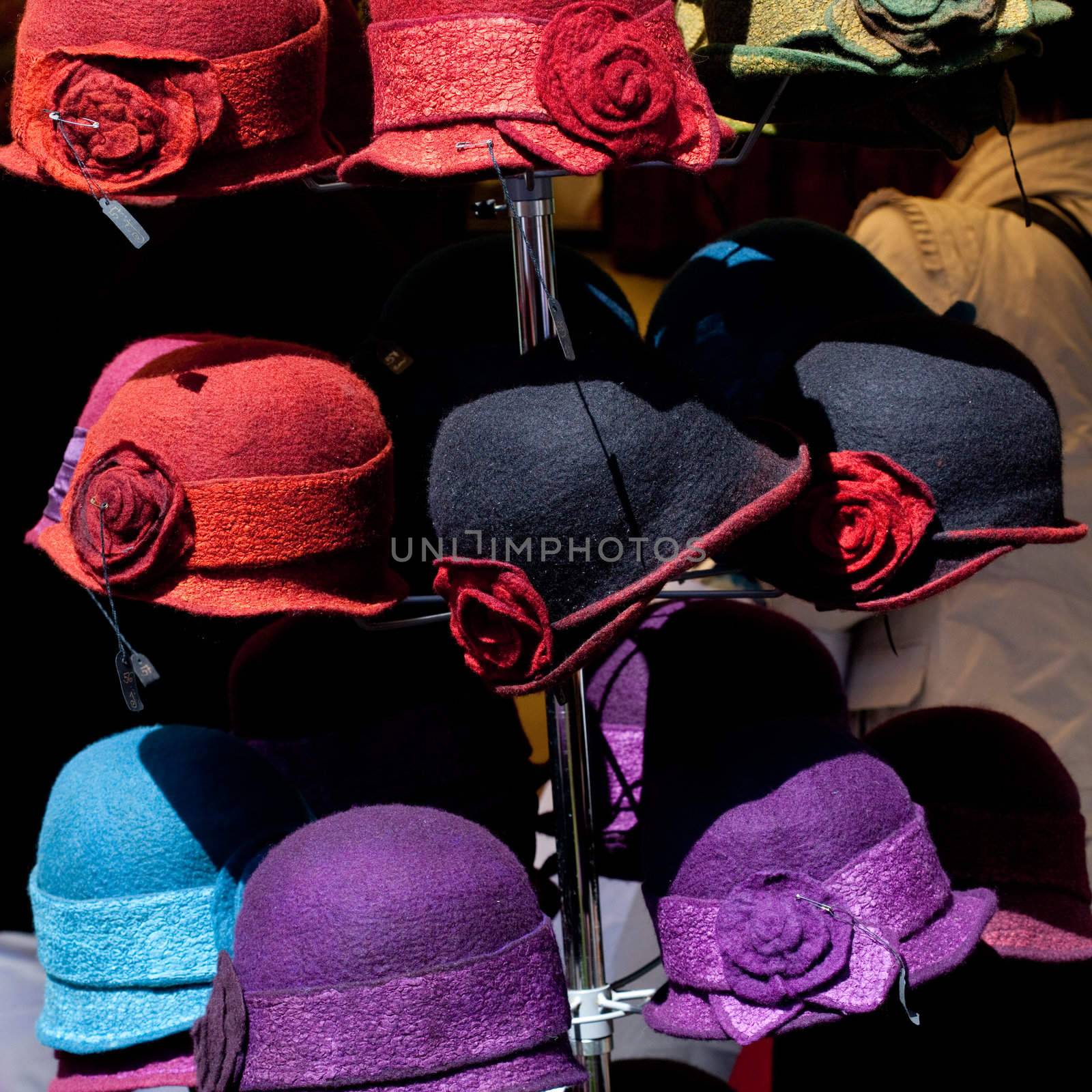 colorful hats at the fair by jannyjus