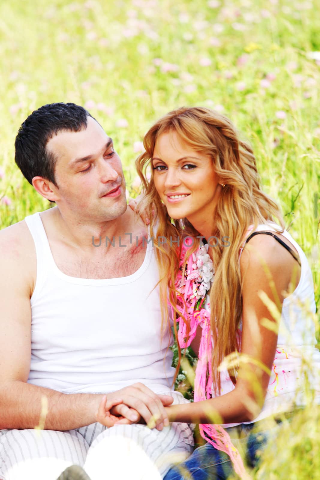 two lovers on grass field