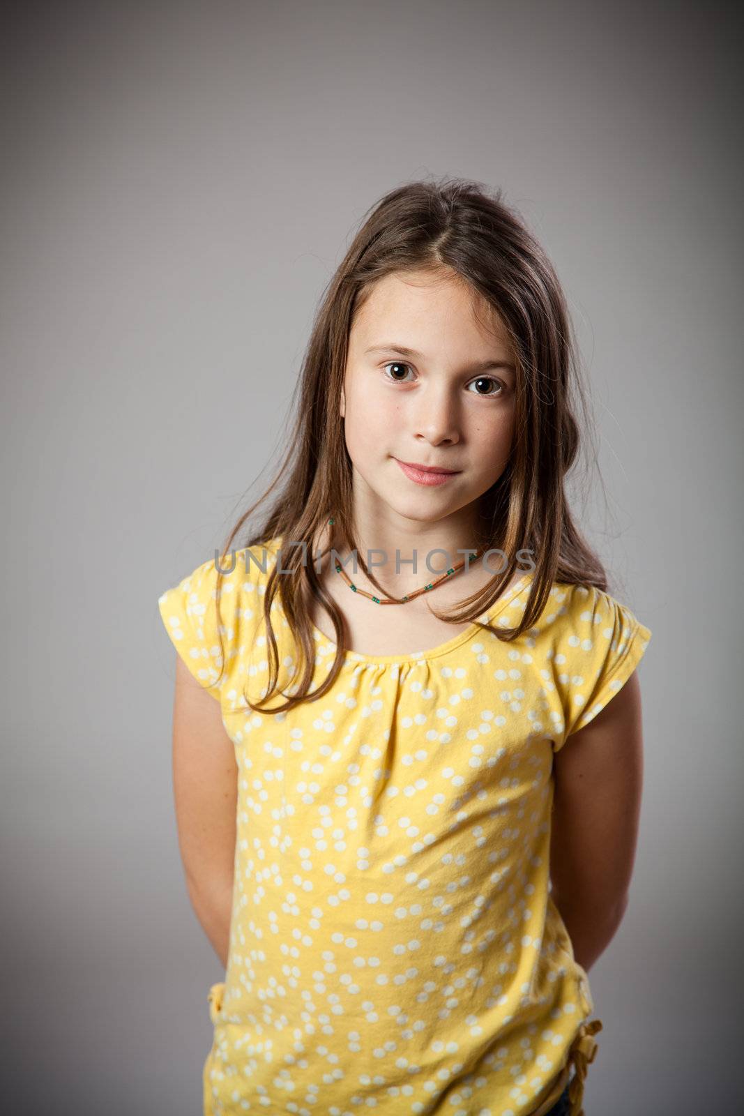 Girl in studio smiling and happy