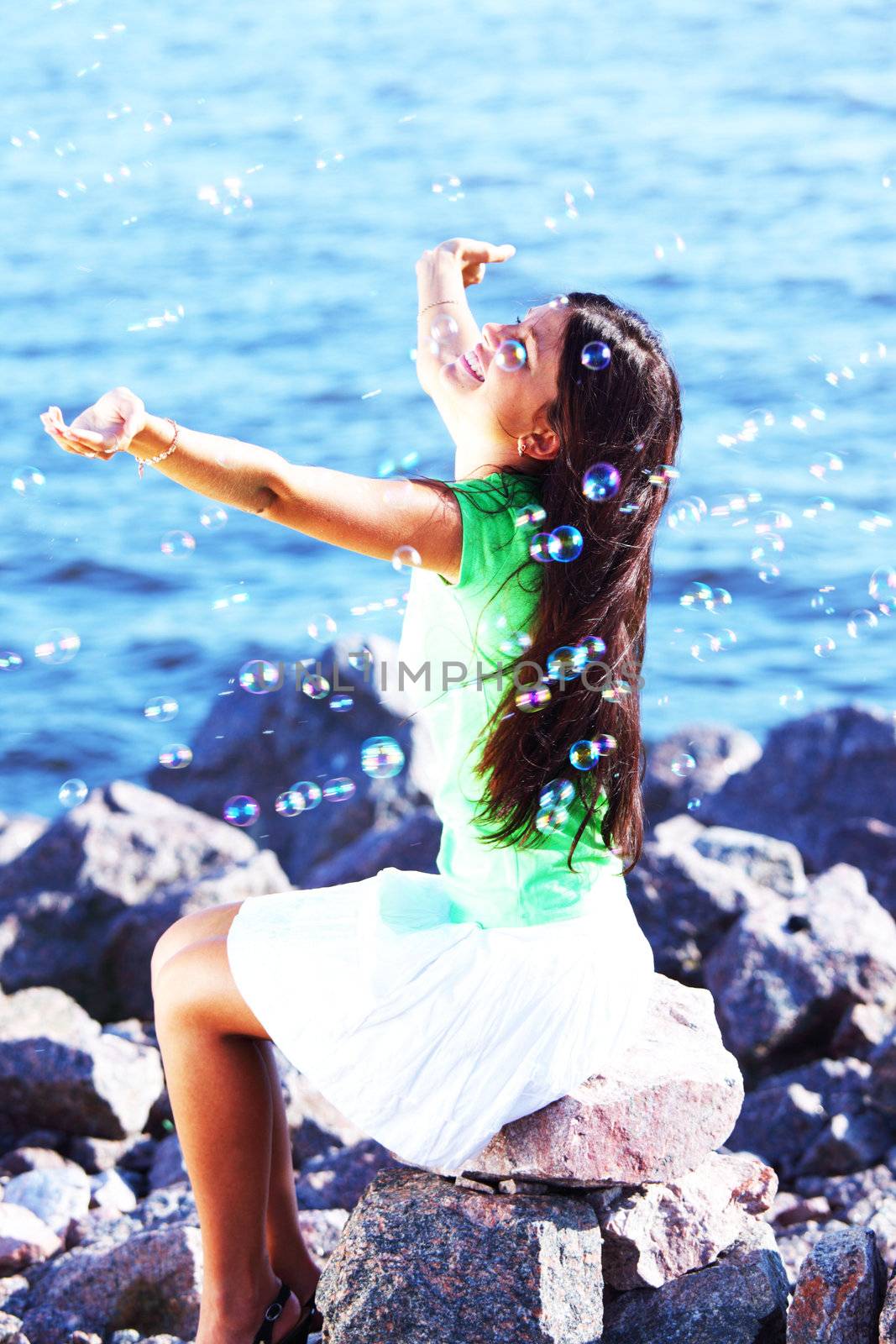 woman relax blue sea and bubbles on background