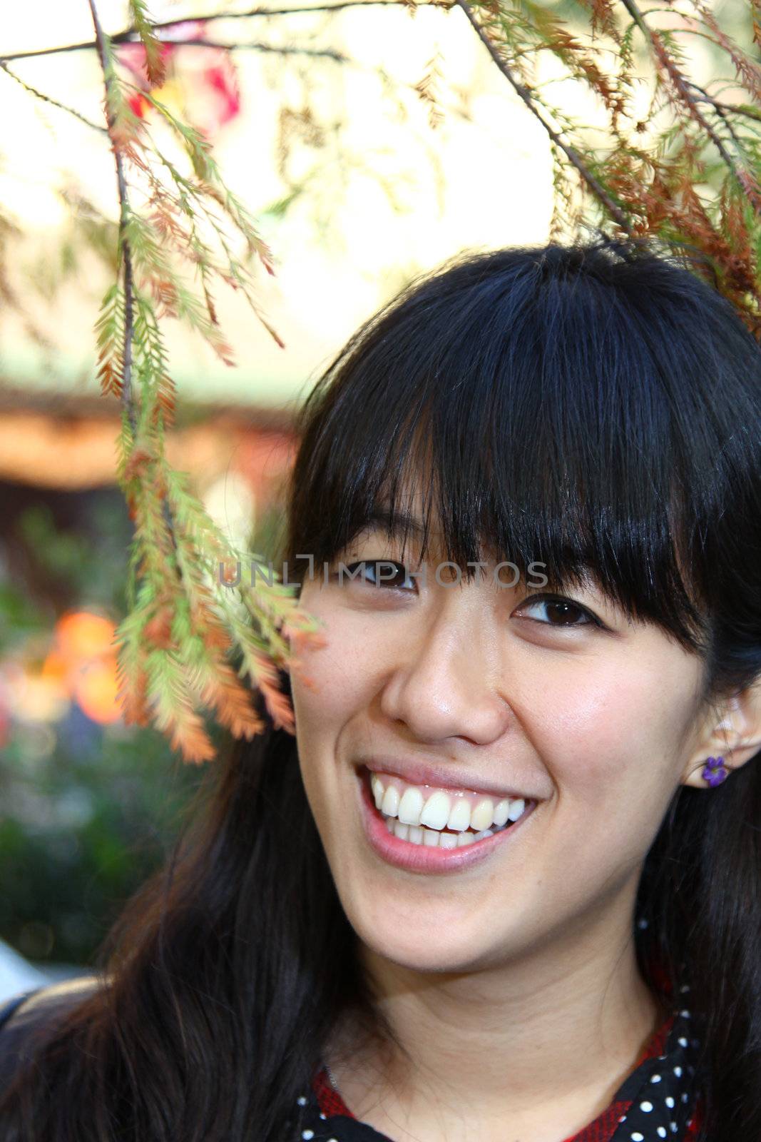 Asian woman with big smile