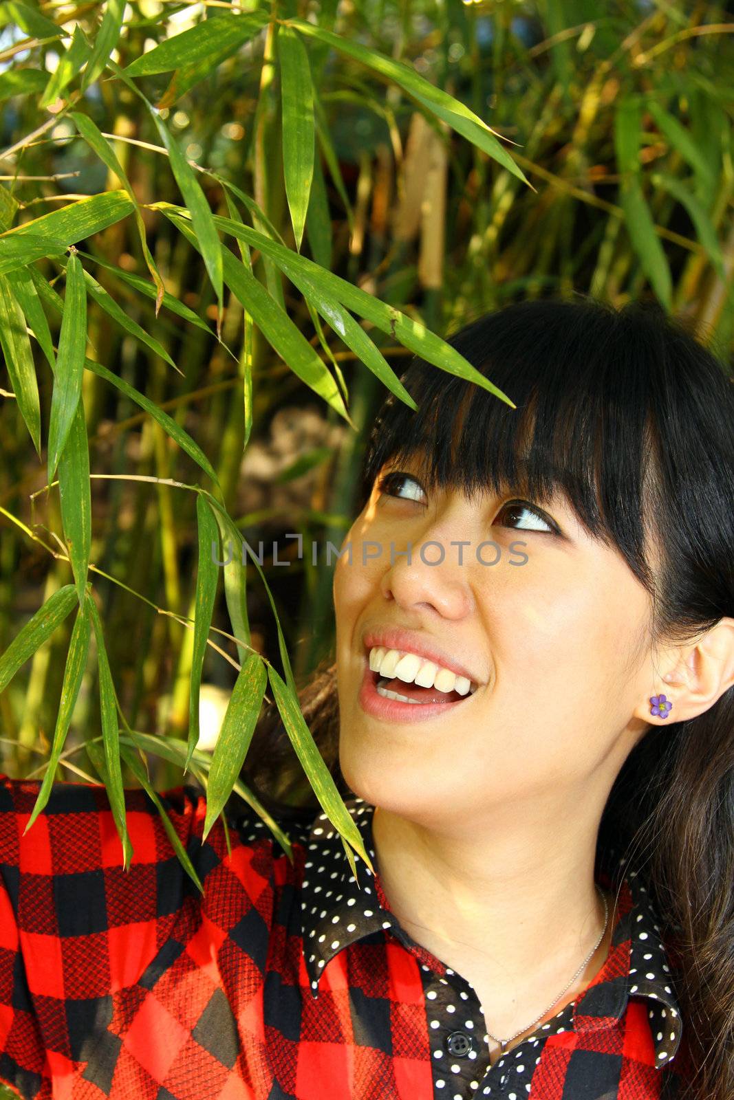 Asian woman happy in nature