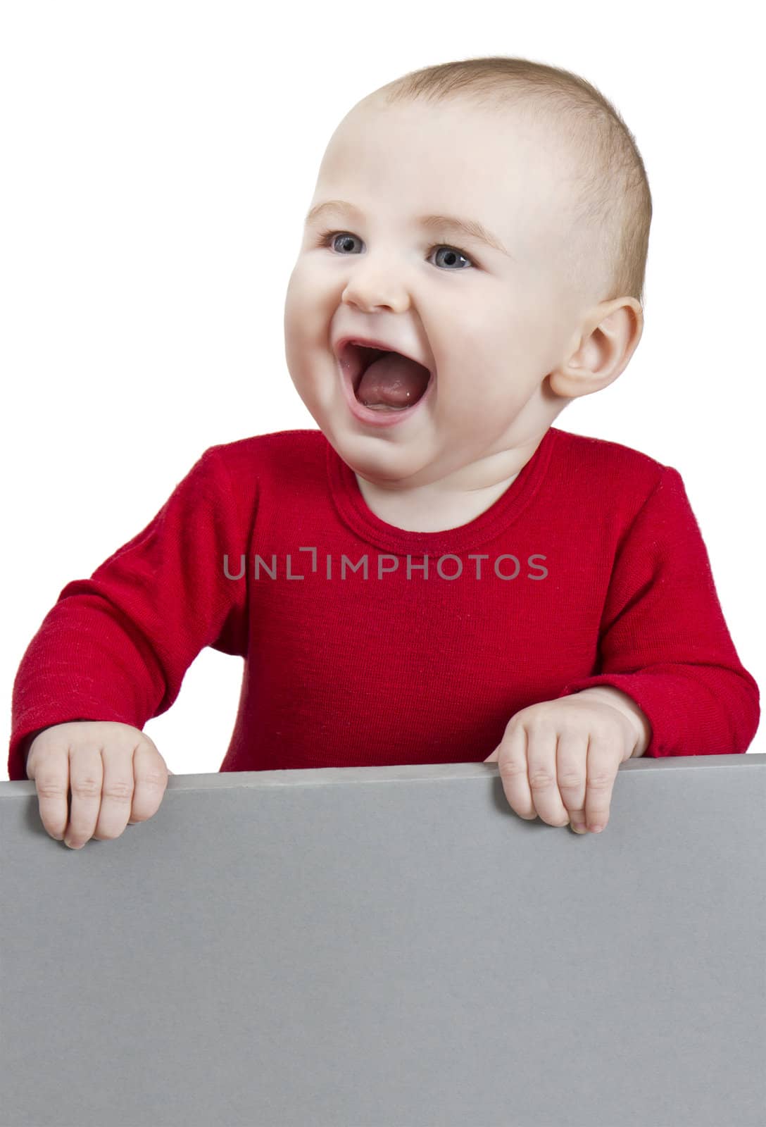 young child holding sign. isolate on white background