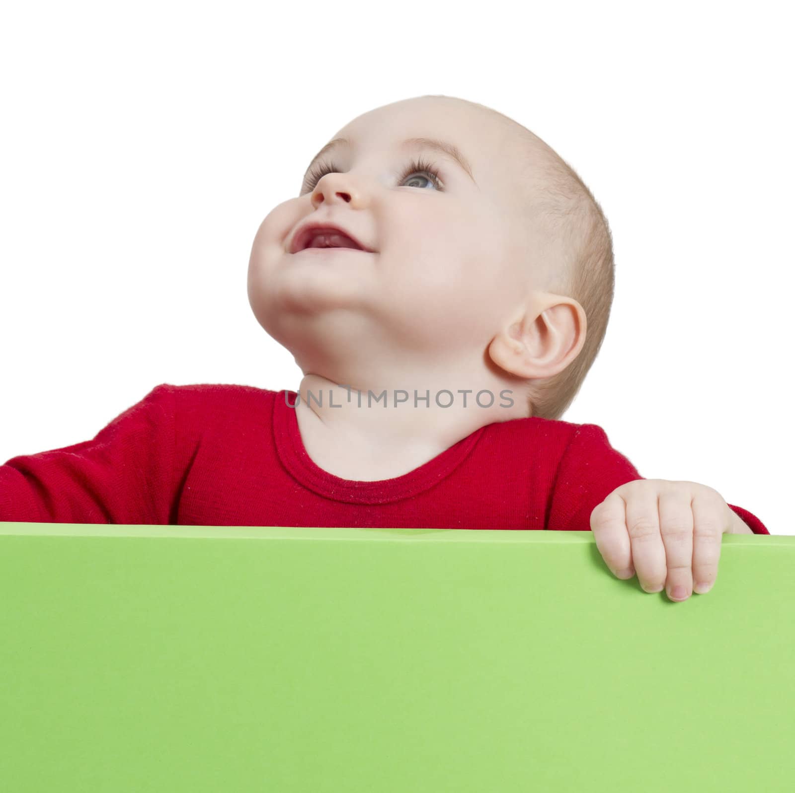 young child holding shield. isolate on white background