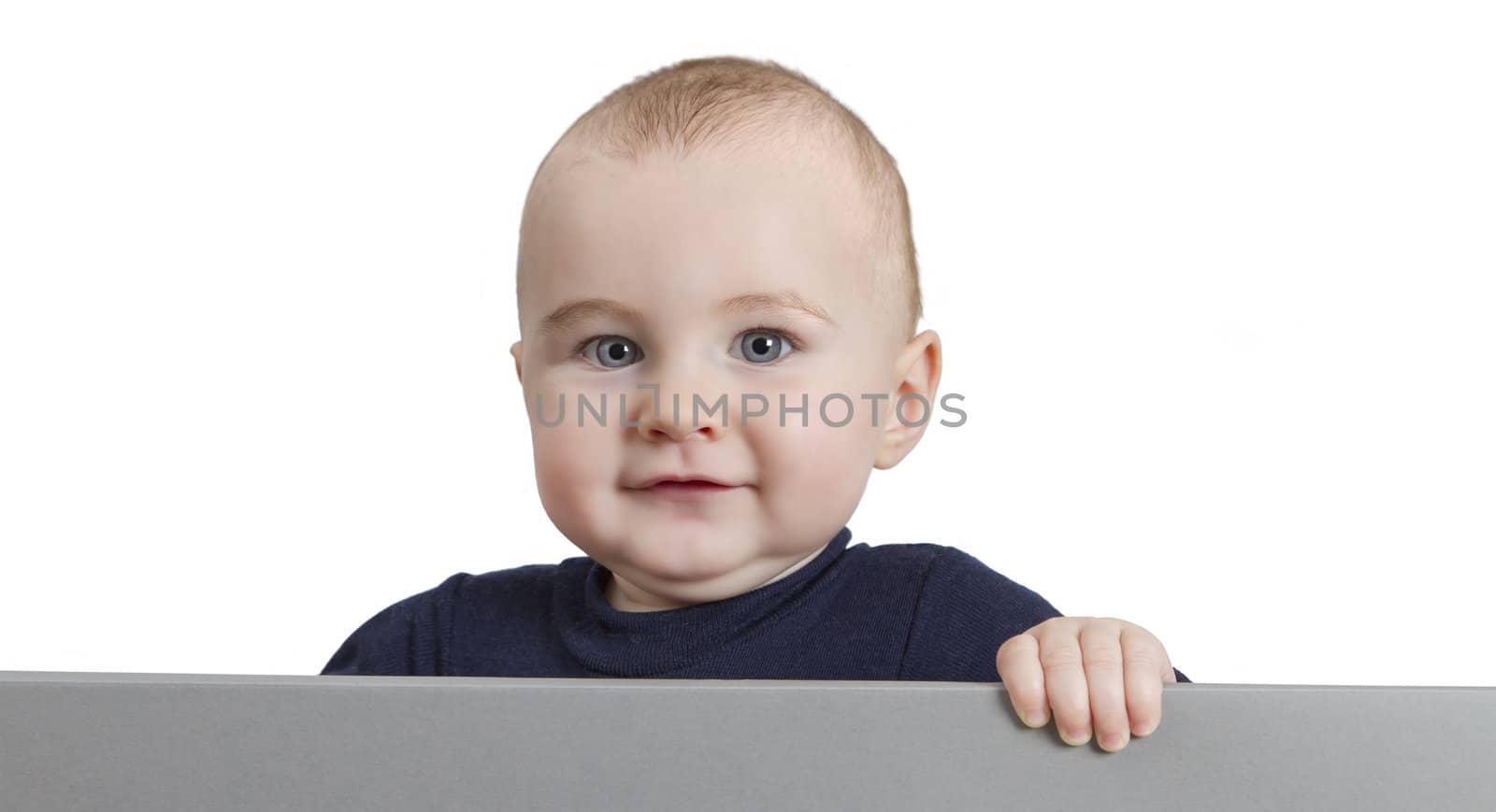 young child looking to camera. isolate on white background