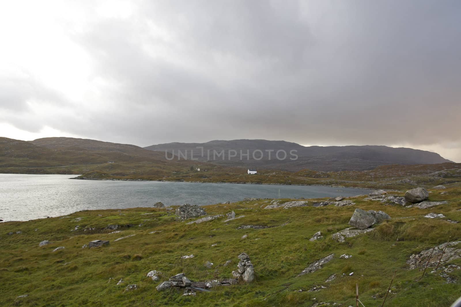 coastal landscape on scottish isle with wetland and hills